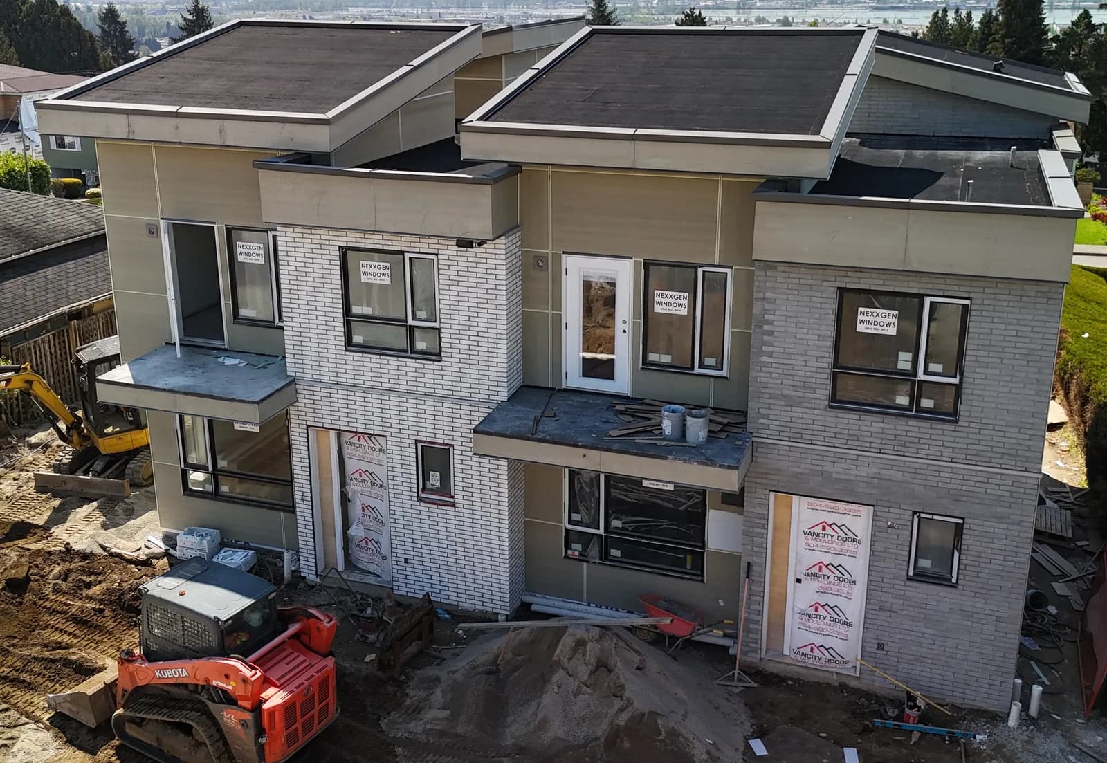 Brick character home in active renovation, New Westminster heritage zone, MV Construction