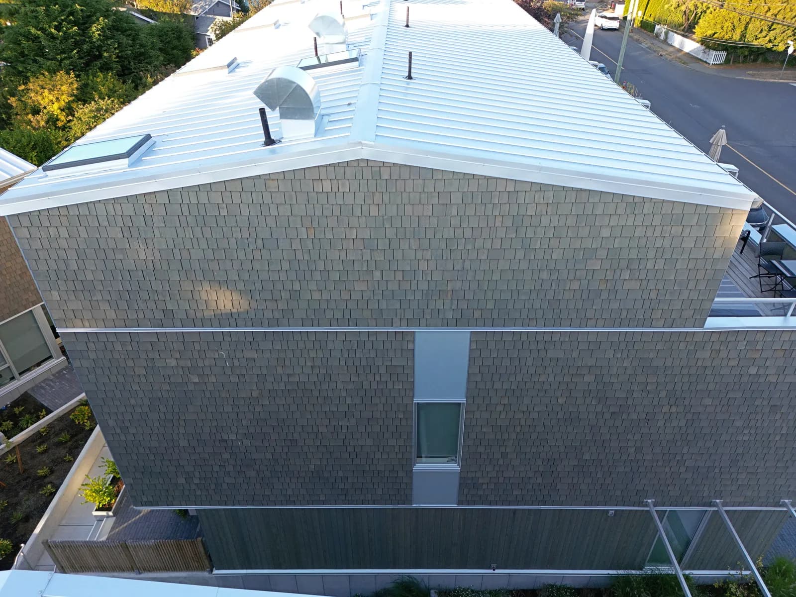 Lap siding install detail on a Vancouver multi-family: fiber cement siding BC project