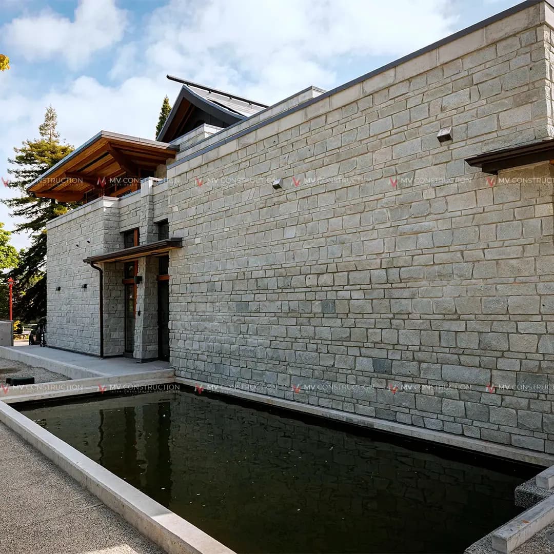 Cultured stone veneer on a custom home in Horseshoe Bay — MV Construction project