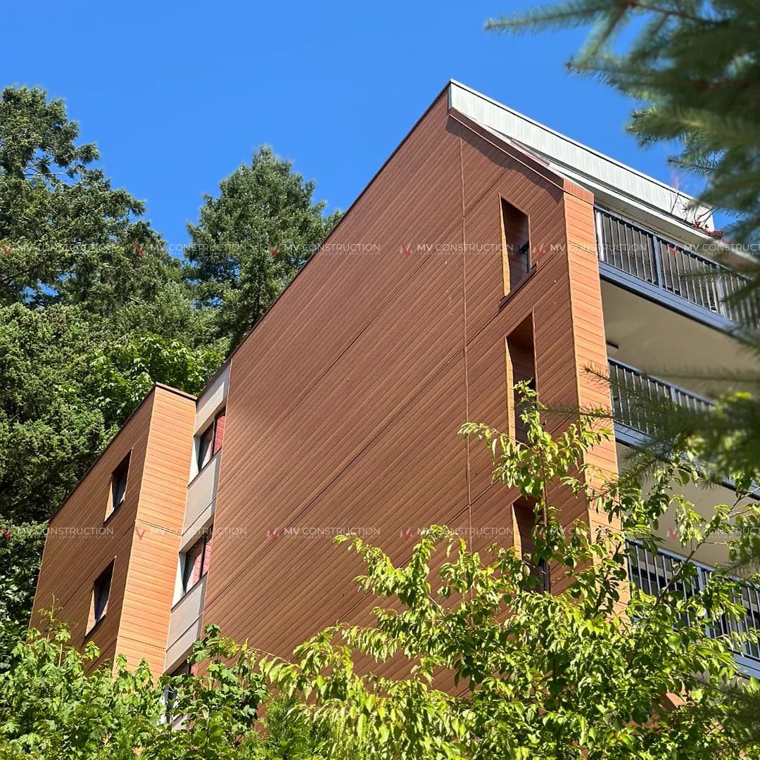 Multi-family longboard siding building in treed Fraser Valley setting — MV Construction project