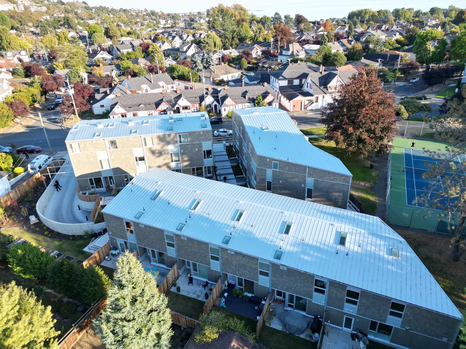 Metal-roof townhome complex in Metro Vancouver ready for fall exterior maintenance ahead of BC's atmospheric river season